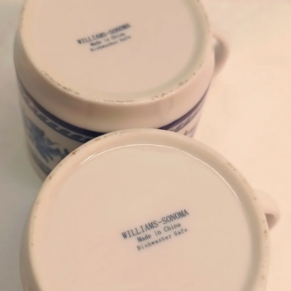 Set of 2 Williams-Sonoma Blue and White Leaf Band Mugs.